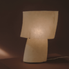 Kilzi lighting | Mush Tiny fiberglass table lamp, a elegant designer lamp with soft organic shapes resembling a growing mushroom. Perfect for home decor.