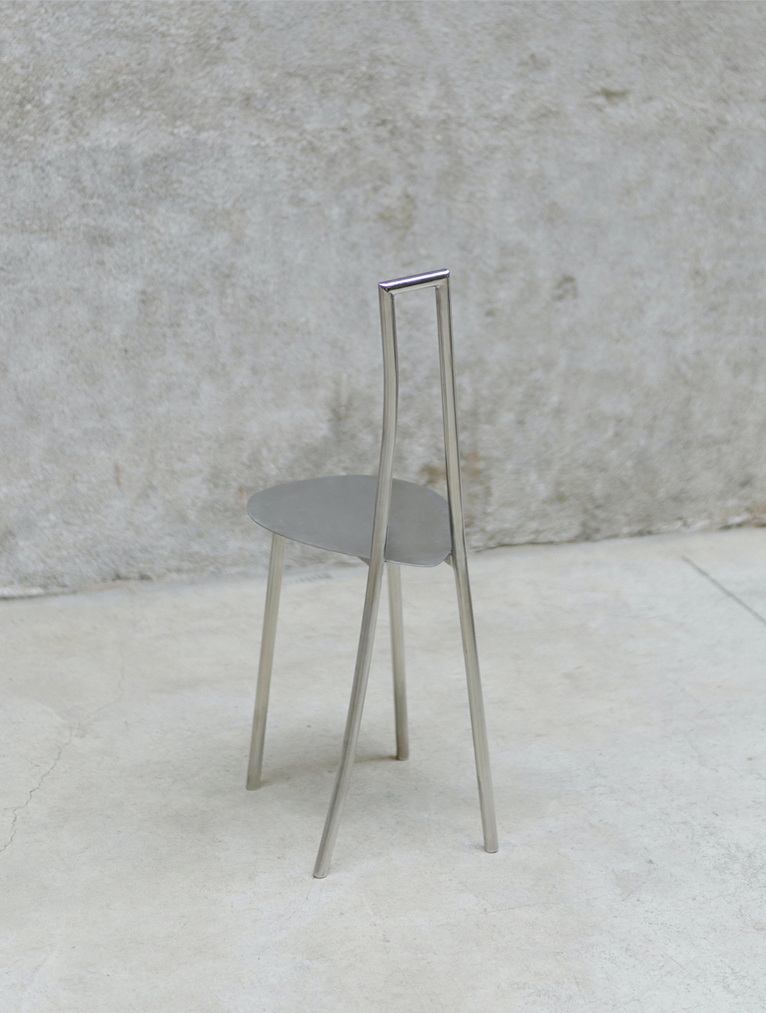 Kilzi seating, minimalist and artistic design chair made of stainless steel, exclusive luxury design.
