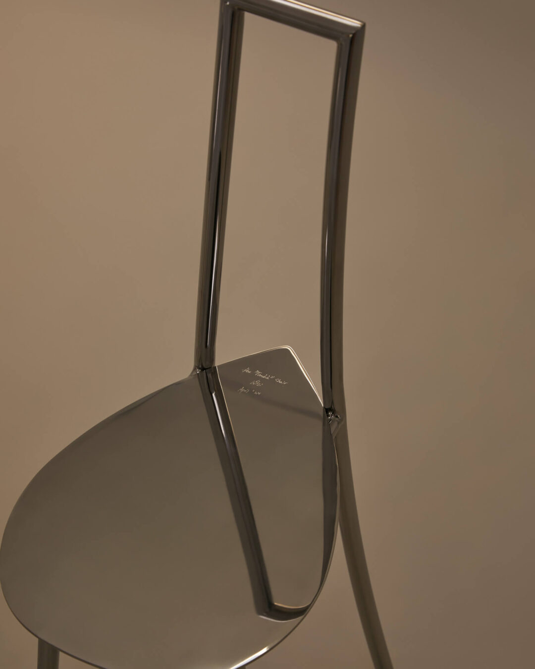 Kilzi seating, minimalist and artistic design chair made of stainless steel, exclusive luxury design.