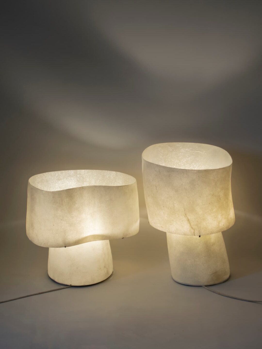 Kilzi lighting | Mush Tiny fiberglass table lamp, a elegant designer lamp with soft organic shapes resembling a growing mushroom. Perfect for home decor.