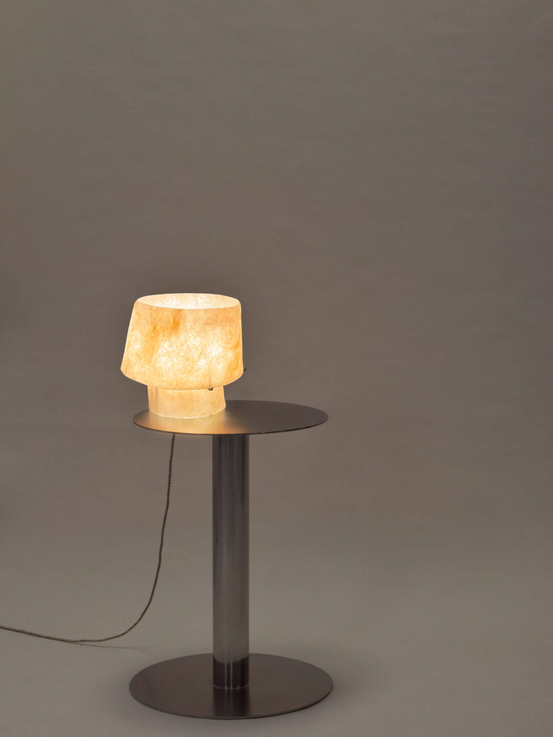 Kilzi lighting | Mush Tiny fiberglass table lamp, a elegant designer lamp with soft organic shapes resembling a growing mushroom. Perfect for home decor.