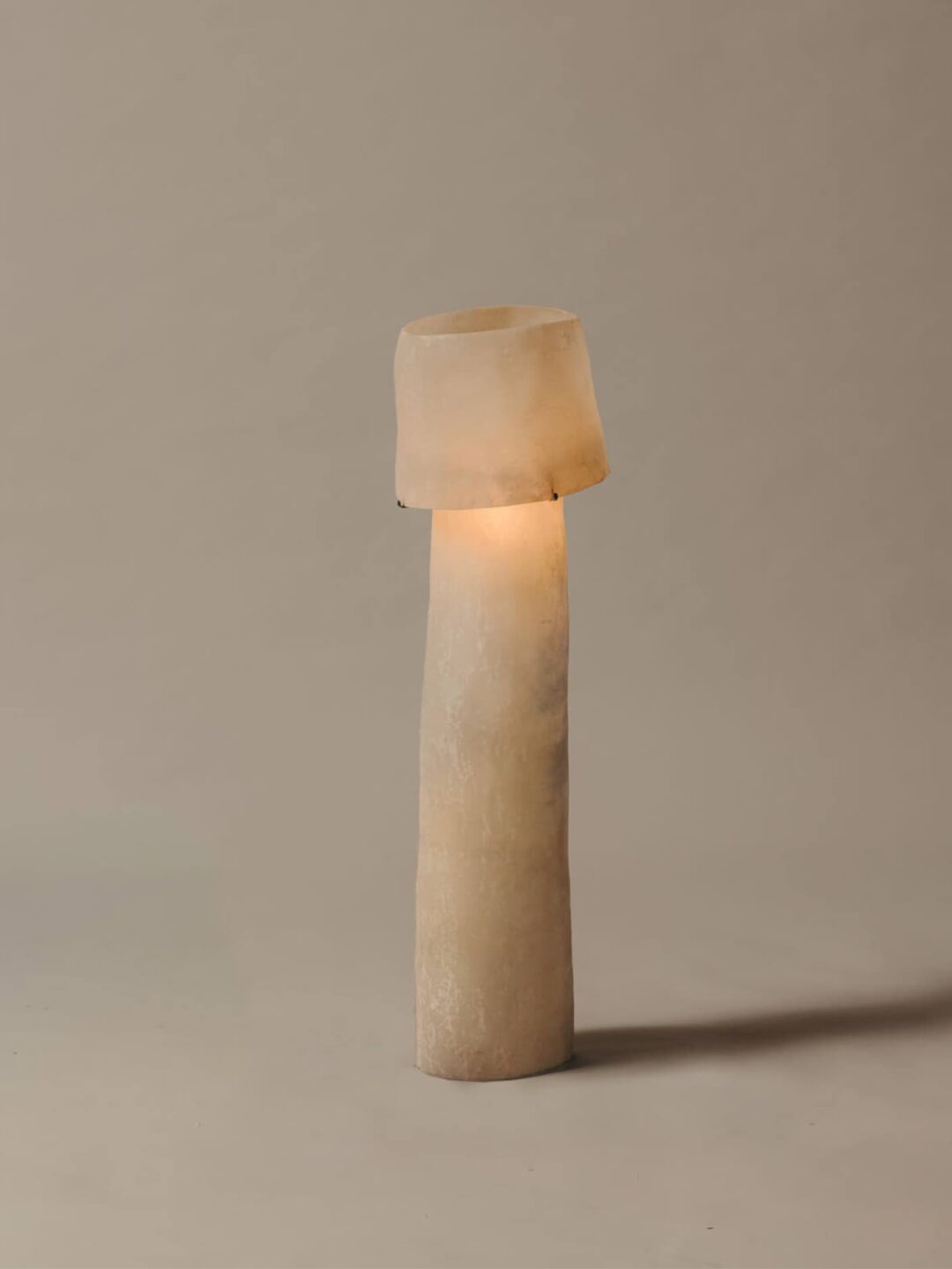 Kilzi lighting | Mush Tower fiberglass lamp, a elegant designer lamp with soft organic shapes resembling a growing mushroom. Perfect for home decor.