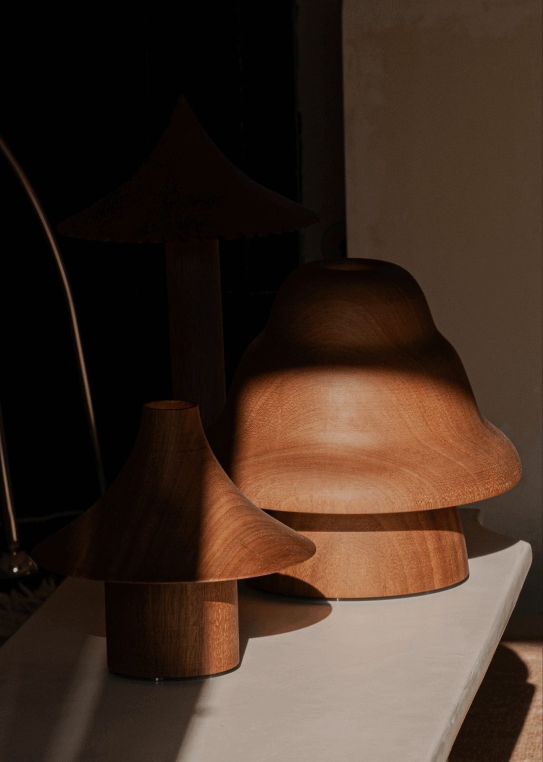 Kilzi lighting | Hat Wobble design table lamp for home decor, a elegant designer lamp of wood soft organic shapes.