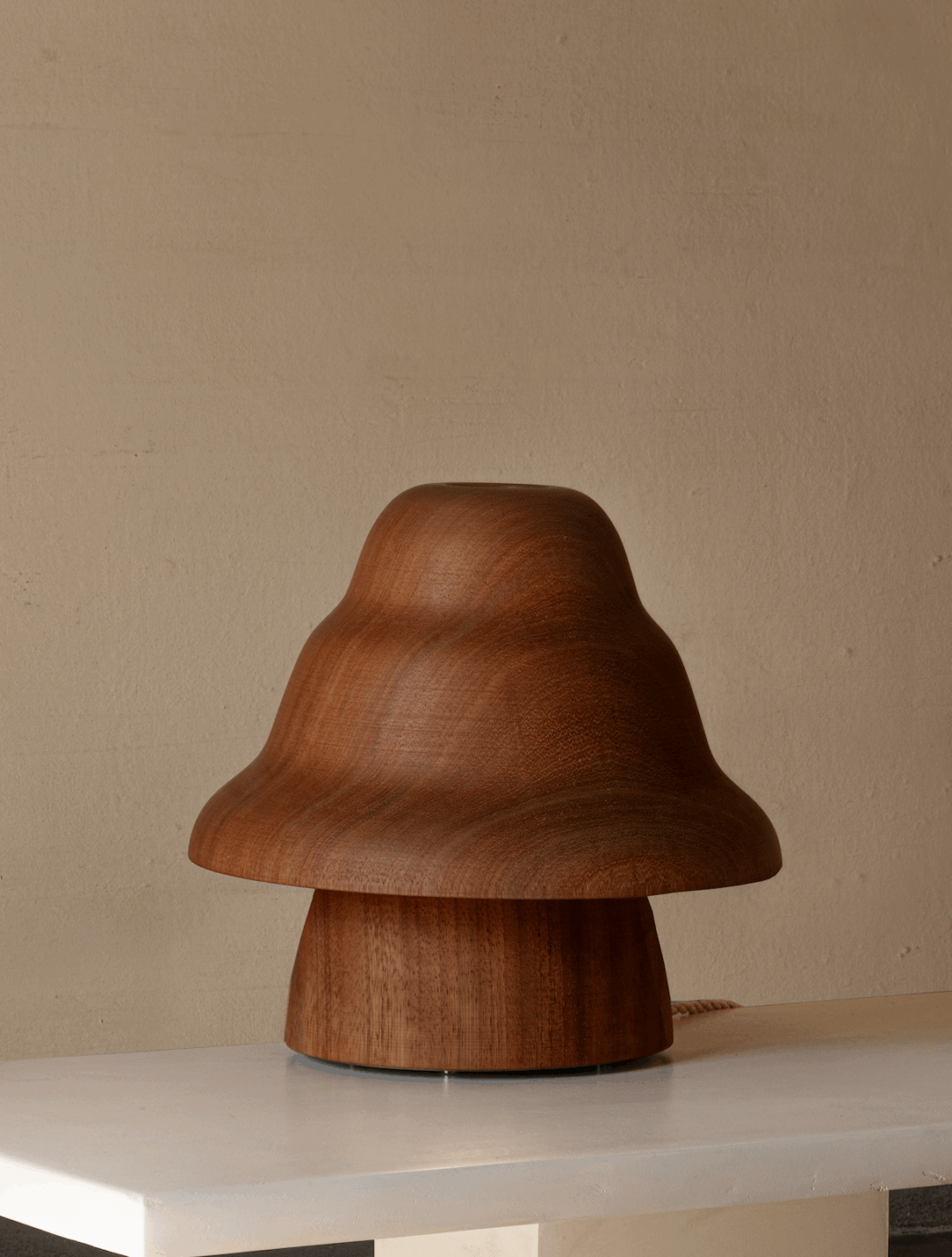 Kilzi lighting | Hat Wobble design table lamp for home decor, a elegant designer lamp of wood soft organic shapes.