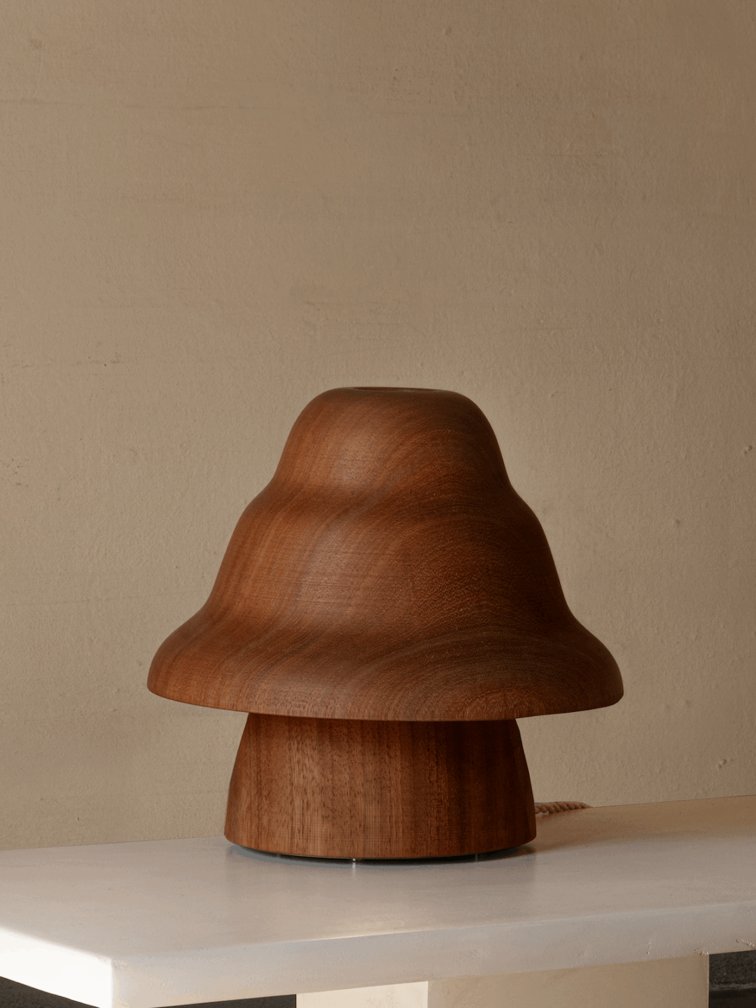 Kilzi lighting | Hat Wobble design table lamp for home decor, a elegant designer lamp of wood soft organic shapes.